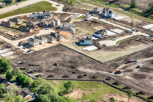 Aerial view of a new residential housing development under construction in the suburbs of Houston, Texas