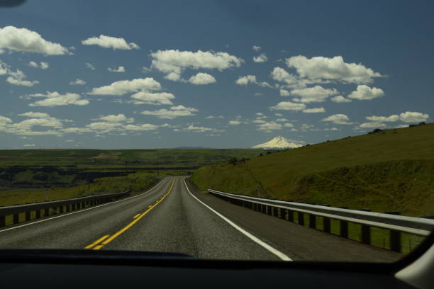 istock Road Leading To Mt. Hood Against Cloudy Sky 1146796383