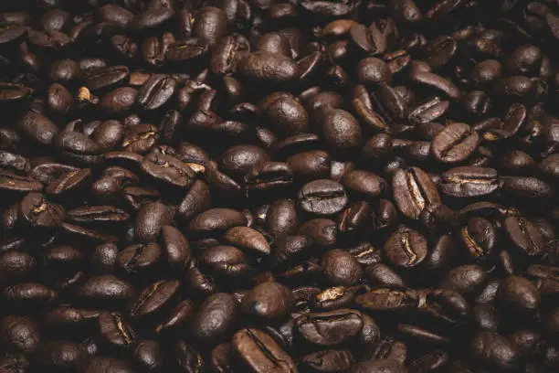 Dark roasted coffee beans for backgrounds