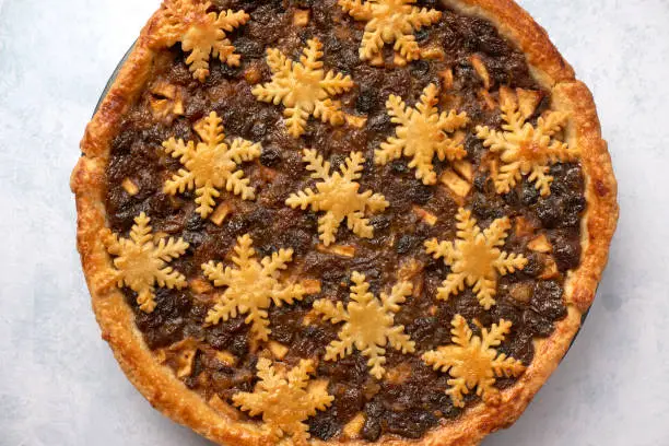 Overhead view of a large whole mince pie, traditional British Christmas food
