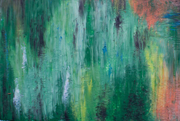 istock colorful and textured background: colorful reflections in pond 1146810381