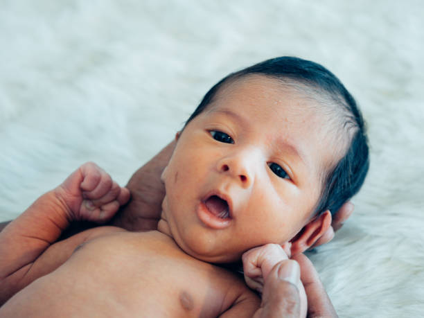 istock Asian newborn baby boy sleeping 1146817119