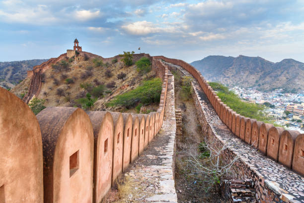 istock Ancient long wall with towers around Amber Fort at evening. Rajasthan. India 1146818062