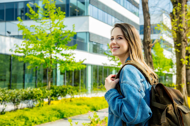 istock A young student with a backpack is the first time near campus of the university. 1146824618