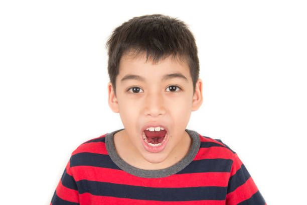 istock Little mix rate boy making fun face in many emotions 1146828445