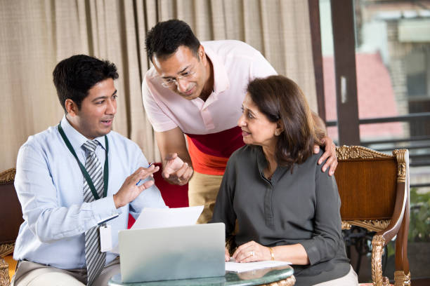 istock Financial advisor with Indian family 1146830195