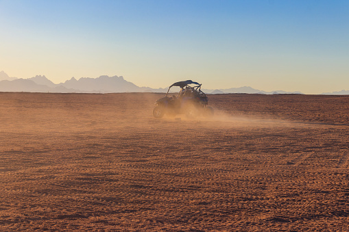 Safari trip through egyptian desert driving buggy cars