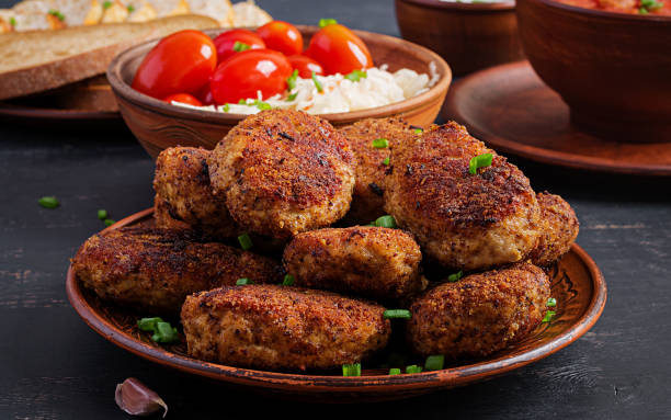 istock Juicy delicious meat cutlets on a dark table. Russian cuisine. 1146832475