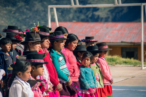 Andean children gathered in the schoolyard stock photo