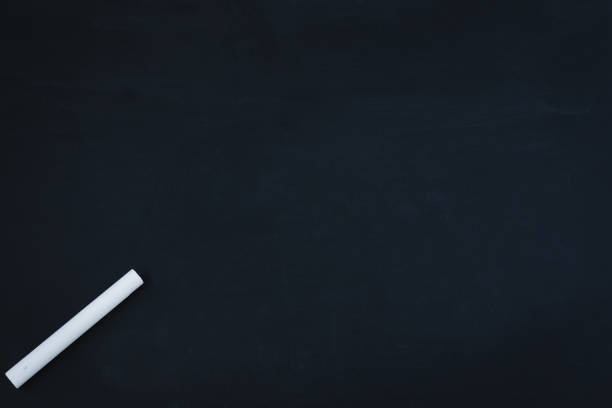 istock Empty chalkboard background. White chalk on chalkboard and copy space used for add messages. 1146835324