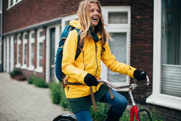 istock Dutch woman with bicycle in Amsterdam 1146835404