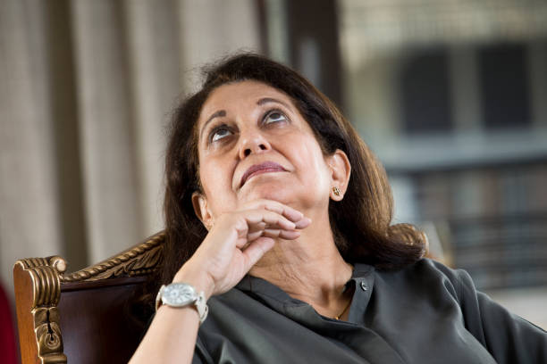 istock Thoughtful senior woman looking up 1146836019
