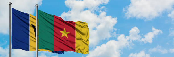 Barbados and Cameroon flag waving in the wind against white cloudy blue sky together. Diplomacy concept, international relations. Barbados and Cameroon flag waving in the wind against white cloudy blue sky together. Diplomacy concept, international relations. yaounde photos stock pictures, royalty-free photos & images