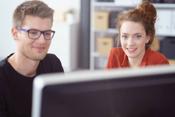 Attractive young woman working in the office