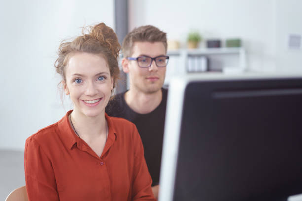 istock Friendly young businesswoman working in an office 1146841470