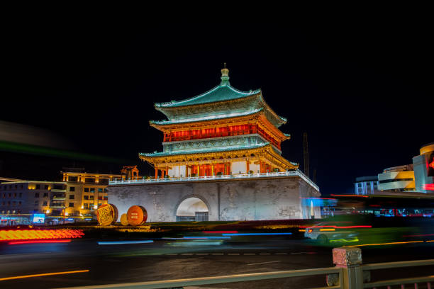 istock Traffic Zooms Passed Historic Bell Tower in Xi'an China 1146841676