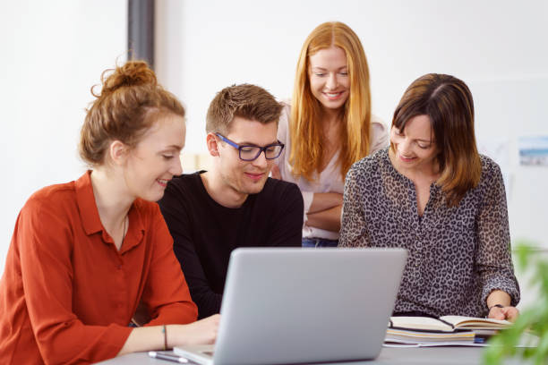 istock Handsome young professionals in business office 1146845112