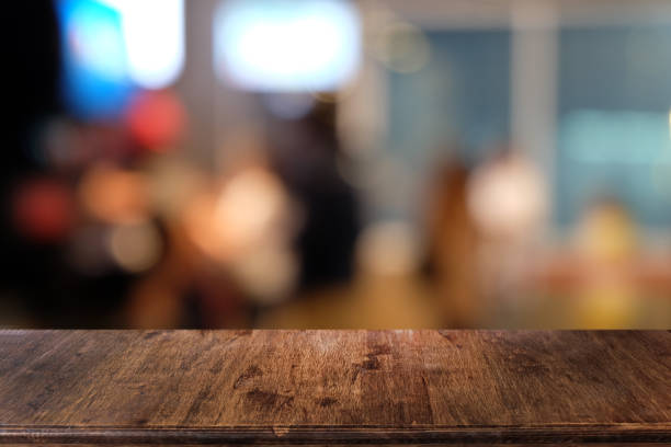 istock Empty dark wooden table in front of abstract blurred bokeh background of restaurant . can be used for display or montage your products.Mock up for space. 1146848092