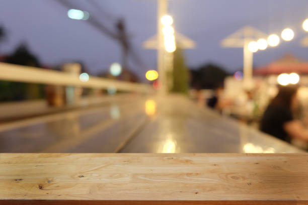 istock Empty dark wooden table in front of abstract blurred bokeh background of restaurant . can be used for display or montage your products.Mock up for space. 1146848099
