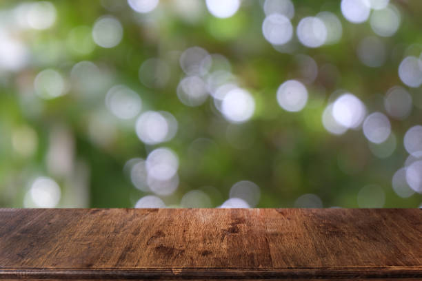 istock Empty dark wooden table in front of abstract blurred bokeh background of restaurant . can be used for display or montage your products.Mock up for space. 1146848103