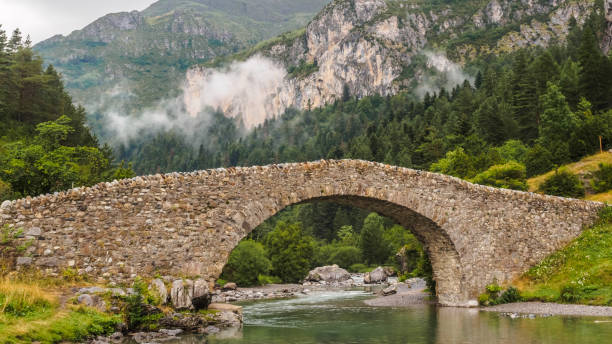 Bujaruelo ancient bridge in Pyrenees range, spain