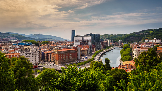 Views of the Abandoibarra promenade next to the river in Bilbao, Spain