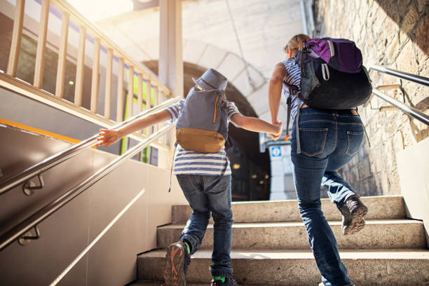 Mother and son running for the train in train station of Monterosso, Cinque Terre, Italy Mother and son tourists desperately running to catch the train in Monterosso, Cinque Terre, Italy.
Nikon D850 running to catch the train stock pictures, royalty-free photos & images