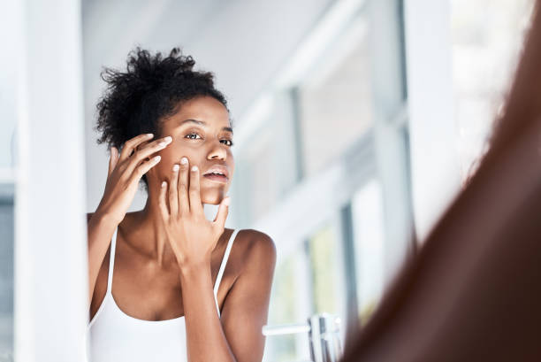 Giving her skin the once over