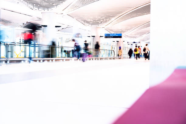 istock Blurred People Using Walkway at Airport 1146862760