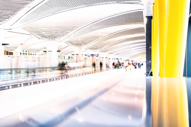 istock Blurred People Using Walkway at Airport 1146862800