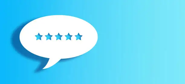 Photo of White Chat Bubble With Cut Out 5 star Shape Over Blue Background