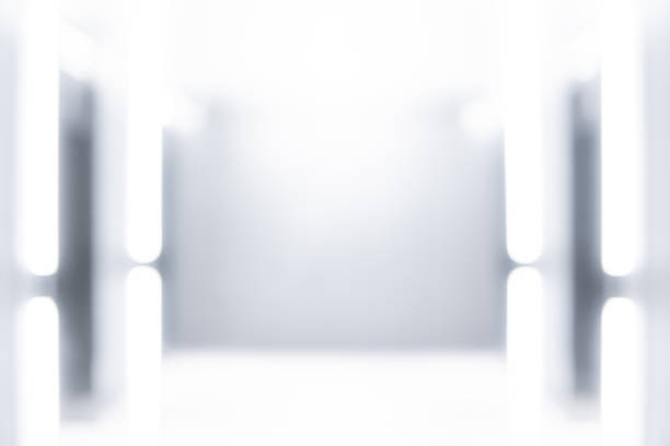 istock Abstract blur modern art gallery museum. Blurred white exhibition hall interior room. Defocused bokeh effect for background or backdrop 1146867367