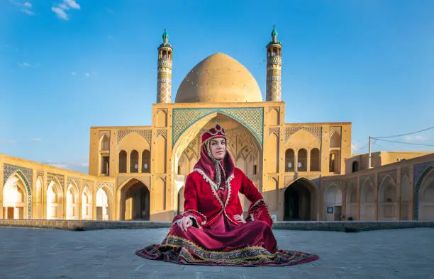 Photo of beautiful young iranian lady in a mosque