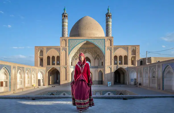 Photo of beautiful young iranian lady in a mosque
