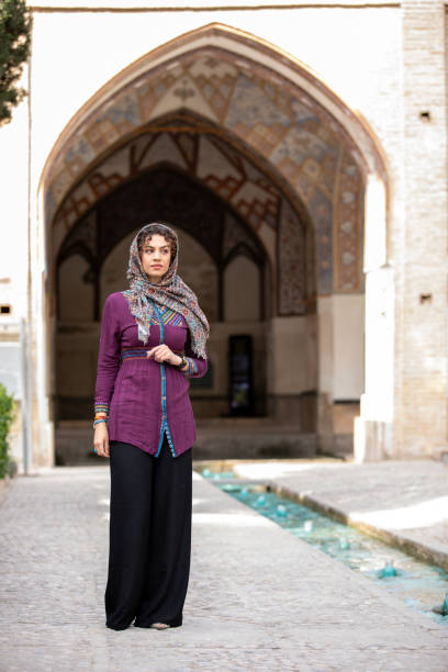 istock iranian lady in Fin gardens in Kashan, Iran 1146870628