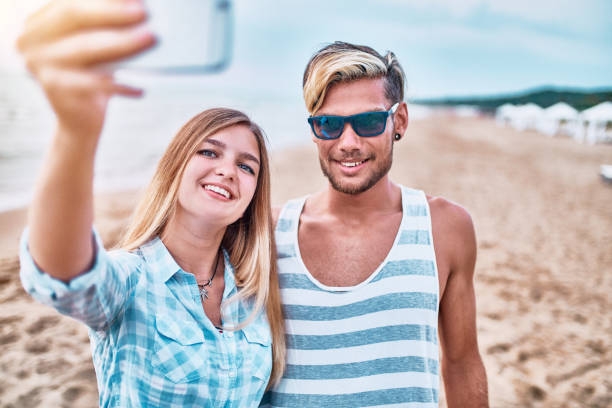 istock Young Couple taking selfie at vacation 1146871061