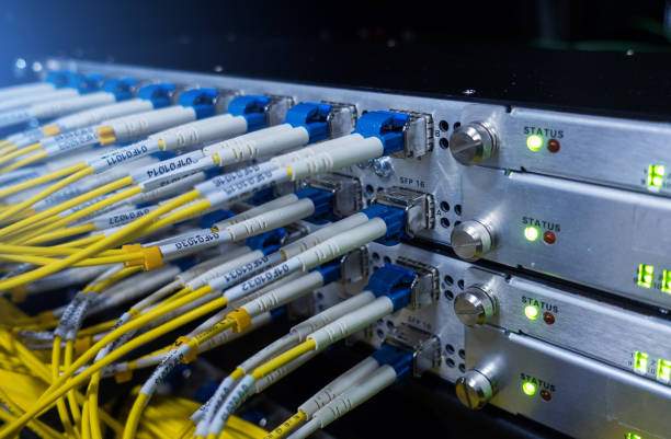 istock Fiber Optical connector interface. Fibre Channel swich. Severs computer in a rack at the large data center 1146876681