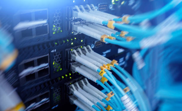 istock Fiber Optical connector interface. Fibre Channel swich. Severs computer in a rack at the large data center 1146876713