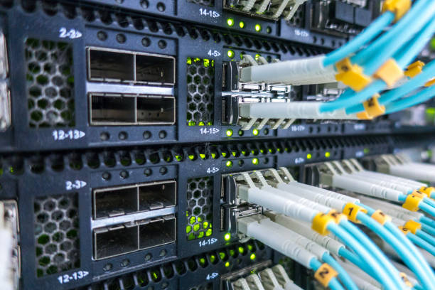 istock Fiber Optical connector interface. Fibre Channel swich. Severs computer in a rack at the large data center 1146877224
