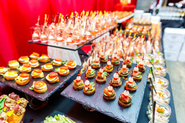 istock appetizers on skewers, desserts. fruit smoothie. Salads. Snacks. Buffet 1146877245