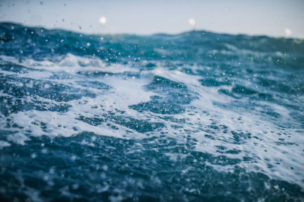 istock Out in a rough sea, waves crashing 1146883686