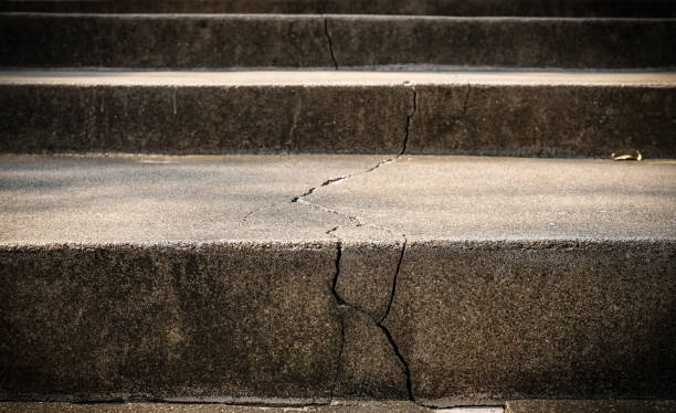 istock Broken old concrete staircase with cracked background texture 1146886060