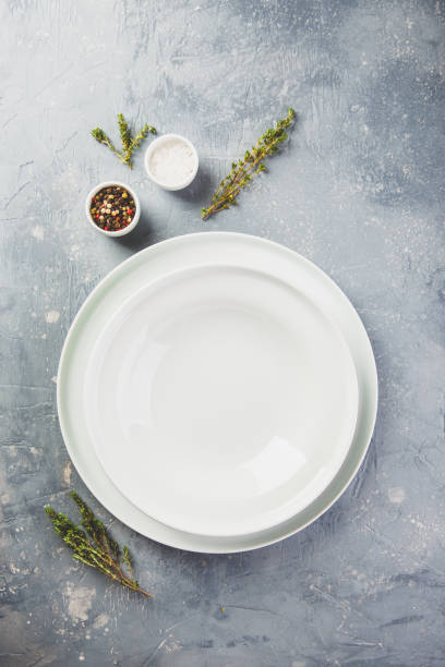 istock Table setting with cutlery, pasta, tomatoes and herbs 1146886213