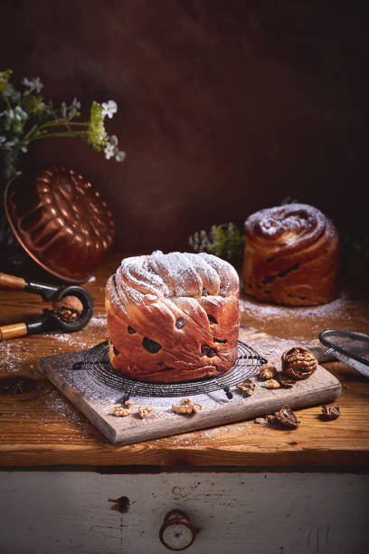 istock Panetone kulich craffin in vintage dark rustic scene. Easter bread kozunak. Wood table copy space concept. 1146886215