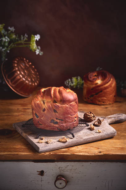 istock Panetone kulich craffin in vintage dark rustic scene. Easter bread kozunak. Wood table copy space concept. 1146886251