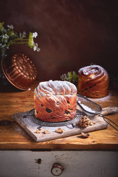 istock Panetone kulich craffin in vintage dark rustic scene. Easter bread kozunak. Wood table copy space concept. 1146886314
