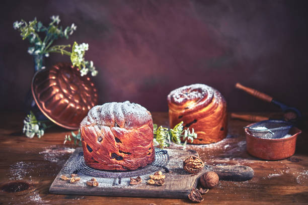 istock Panetone kulich craffin in vintage dark rustic scene. Easter bread kozunak. Wood table copy space concept. 1146886499