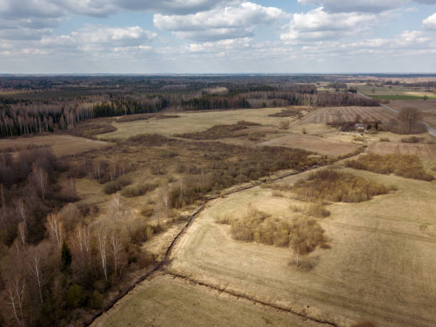 istock aerial view of countryside fields and forests with small lakes 1146889419