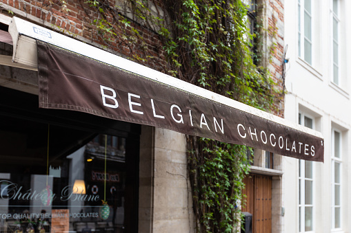 Antwerp, Belgium - April 25th, 2019: Belgian Chocolate shop selling varieties of pralines and confectionery in the Antwerp city center, Belgium Europe
