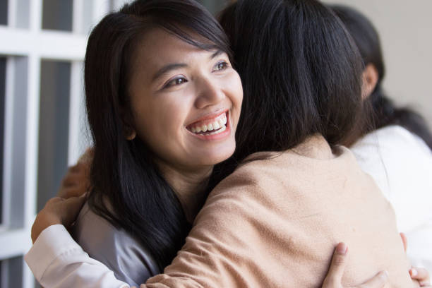 istock woman embracing each other 1146894786